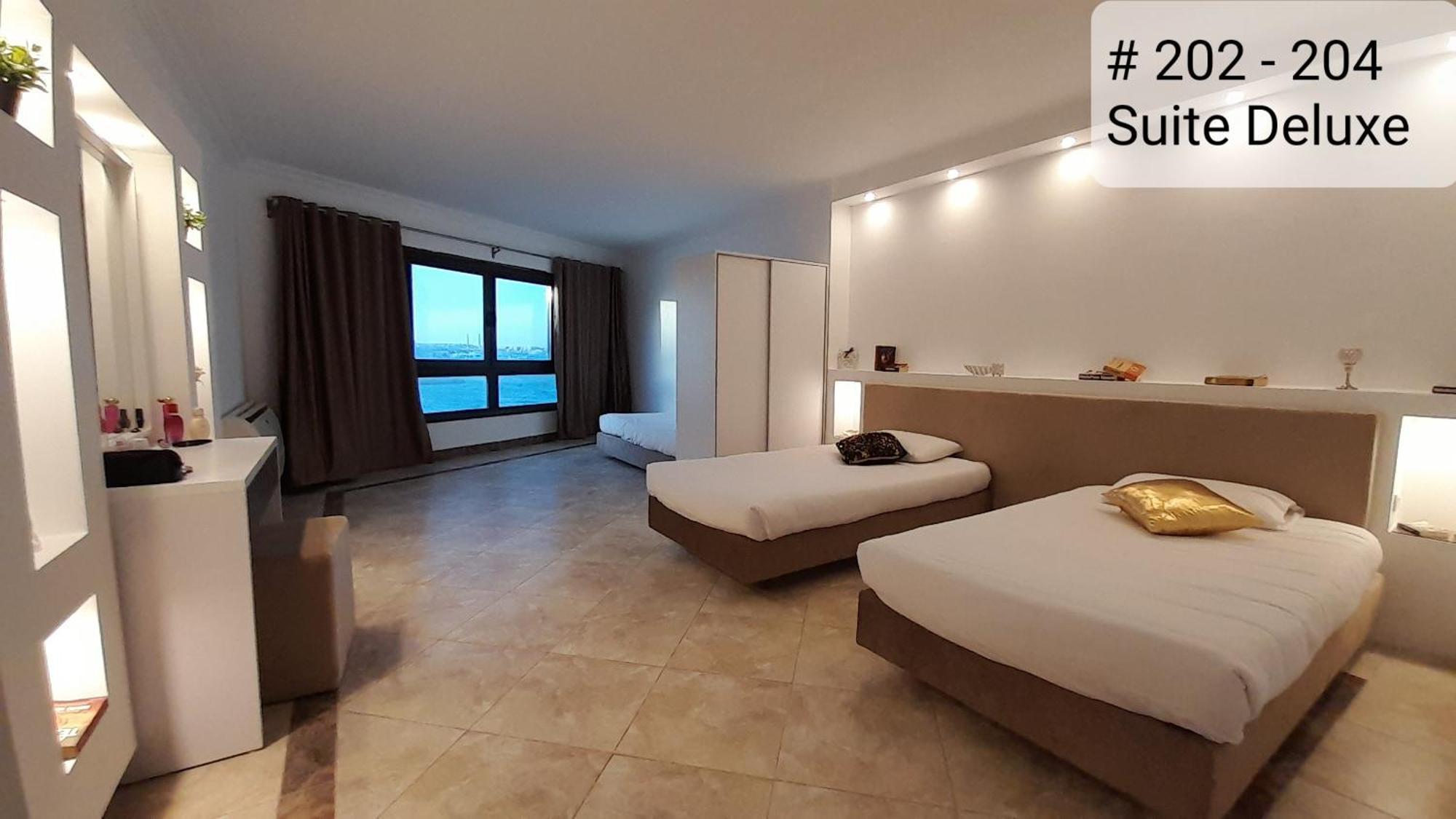 Alia Beach Residence Hurghada Quarto foto